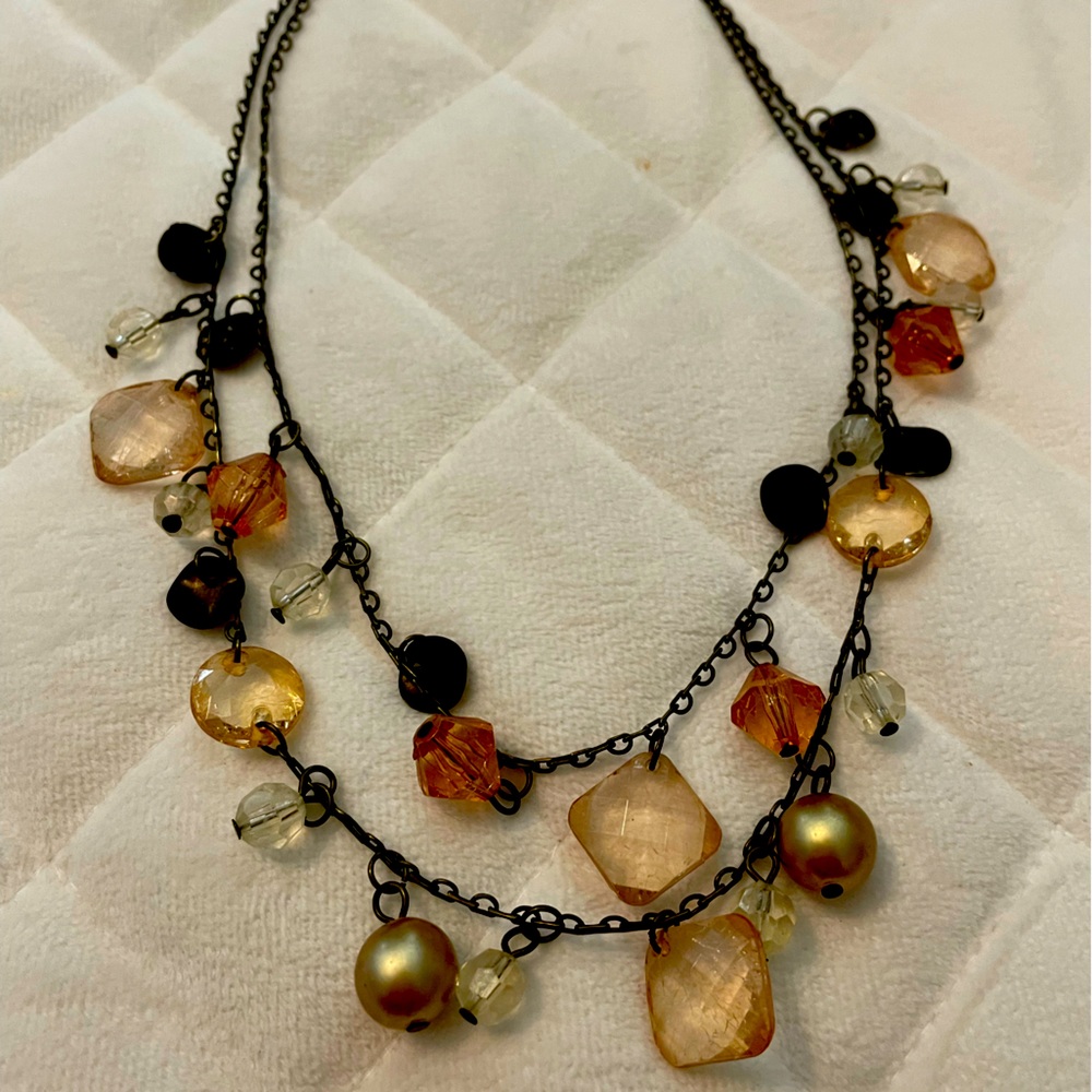 Artisan Darker chain with warm colored pieces of stone, glass 10/12” long.